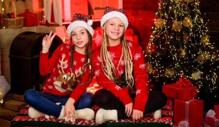 Photo for Family love. santa children. Shopping Center. kid store. merry christmas. Are you ready. happy small girls has xmas mood. new year party celebration. sisters spend family holiday together. - Royalty Free Image