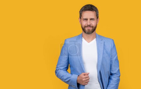 Photo for Photo of handsome businessman wear suit with copy space. businessman wearing formal jacket. caucasian businessman in jacket isolated on yellow background. businessman in studio. - Royalty Free Image