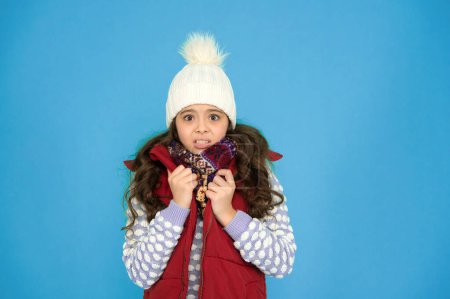 Photo for Feeling good any weather. Childhood memories. Child care. Cold winter days. Vacation time. Stay active during season. Kid wear knitted warm clothes. Winter vibes. Youth street fashion. Winter fun. - Royalty Free Image