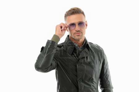 studio shot of handsome grizzled man. adult grizzled man in glasses isolated on white background. grizzled man in coat. adult grizzled cool man.