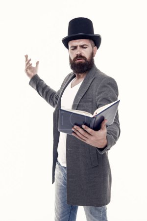Photo for Literary criticism. Faced with senseless drama. Eloquence and diction. Bearded man read book. Poetry reading. Book presentation. Literature teacher. Books shop. Guy classic outfit read book. - Royalty Free Image
