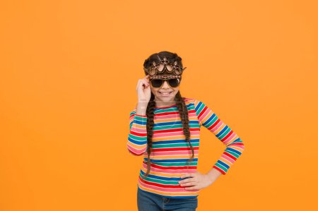 Photo for Self care isnt selfish. Happy child wear prop crown and glasses. Beauty look of small girl. Party look. Casual fashion style. Egoist look. I want you to only look at me, copy space. - Royalty Free Image