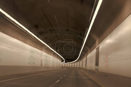 Photo for Modern underground tunnel with gray road tunnel of motion car, road tunnel. - Royalty Free Image