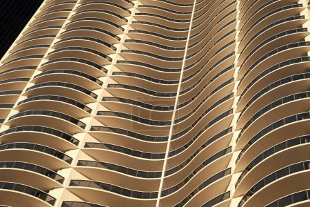 geometric building. detailed curved wavy building background. skyscraper modern city. city designing. perspective view. modern building architecture. abstract background. geometric architecture.