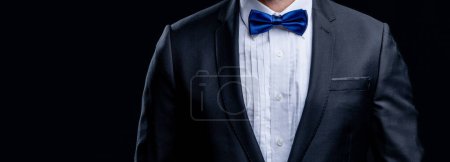 Photo for Cropped view of tuxedo man with formal bow tie. photo of tuxedo man in formal suit. formal tuxedo man isolated on black background. tuxedo man in formal wear studio. - Royalty Free Image