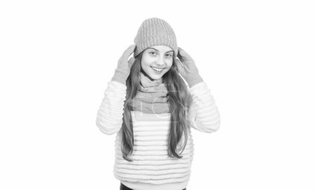Photo for Happy teen girl in knitted hat scarf and gloves warm clothes isolated on white, warm. - Royalty Free Image