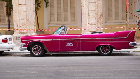 Photo for Havana, Cuba - May 02, 2019: pink chevrolet belair retro car. parked taxi grancar. - Royalty Free Image