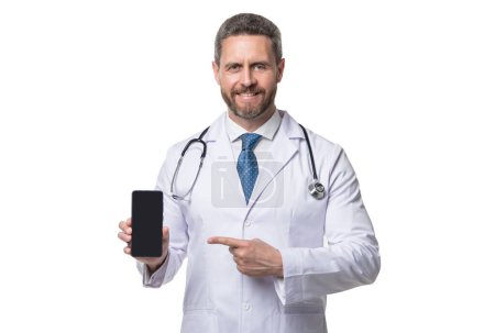 Photo for Medical application. cheerful man doctor presenting medical phone application. emedicine in your phone. - Royalty Free Image