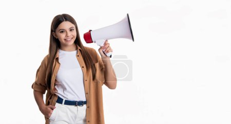 smiling teen girl announcer with loudspeaker isolated on white. teen girl announcer hold loudspeaker in studio. teen girl announcer with loudspeaker. photo of teen girl announcer hold loudspeaker.