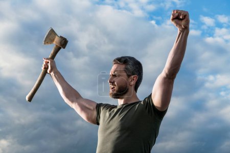 Photo for Confident man with axe. shouting caucasian man hold ax. brutal man on sky background. - Royalty Free Image
