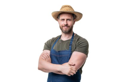 smiling caucasian gardener in hat and apron isolated on white background.