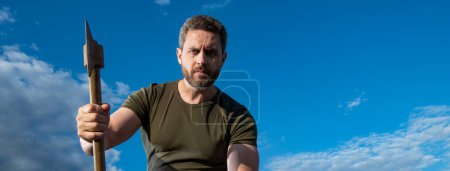 Photo for Man threaten with axe. caucasian man hold ax. brutal man on sky background. selective focus. - Royalty Free Image