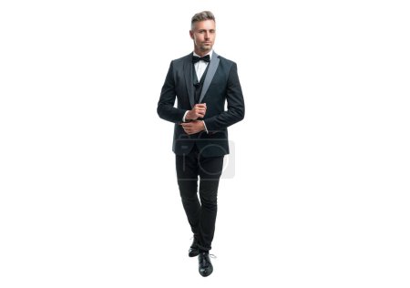 Photo for Grizzled businessman in tuxedo suit with neck bow isolated on white background. full length. - Royalty Free Image