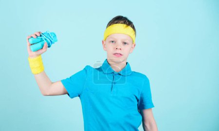 Child sportsman with jump rope. Fitness diet. Ener...