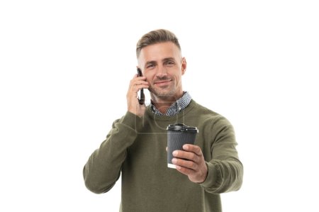 man has call at coffee break smile on background. photo of man has call at coffee break. man has call at coffee break isolated on white. man has call at coffee break in studio.