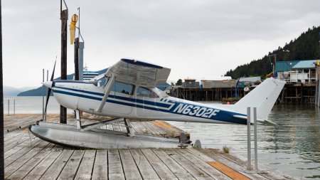 Photo for Wrangell, Alaska USA - May 31, 2019: Cessna 172 floatplane aircraft at pier. - Royalty Free Image