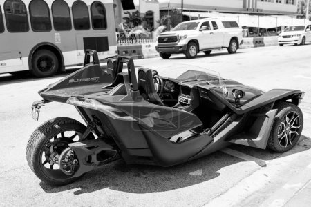 Photo for Miami Beach, Florida USA - April 14, 2021: red polaris slingshot, back side view. three-wheeled motorcycle. - Royalty Free Image