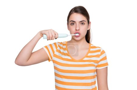 Téléchargez les photos : Amazed girl with toothbrush isolated on white background. - en image libre de droit
