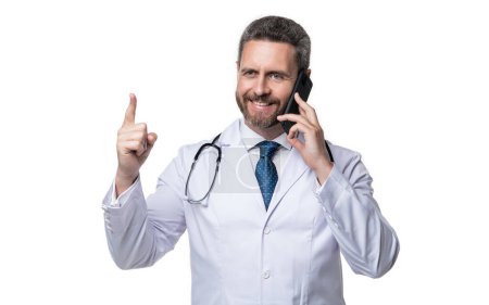 physician online with raised finger on background. photo of physician online with phone. physician online isolated on white. physician online in studio.