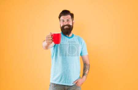 Photo for Energy concept. Hipster barista yellow background. Coffee shop. Bearded man drink morning coffee. Tea time. Coffee with right proportion of milk. Morning habits lifestyle. Fanatic of coffee culture. - Royalty Free Image