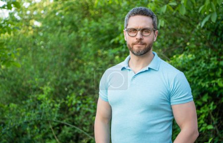 Photo for Photo of man look in glasses, copy space banner. man look in glasses. man look in glasses outdoor. man look in glasses for eyesight. - Royalty Free Image