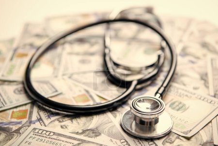 medicine expenses for healthcare concept. money for medicine expenses in selective focus. stethoscope of medicine expenses closeup. photo of medicine expenses currency.