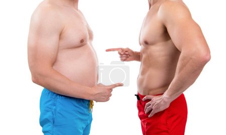 Téléchargez les photos : Avant l'obésité après amincissement des hommes, pointant du doigt. vue recadrée des hommes avec avant l'obésité après amincissement. photo d'avant l'obésité après amincissement. avant l'obésité après minceur comparer - en image libre de droit