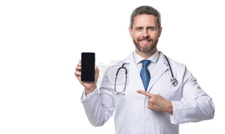 Photo for Medical man pointing finger telehealth on phone screen. medical man show telehealth isolated on white. medical man show telehealth in studio. medical man show telehealth on background. - Royalty Free Image