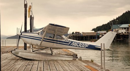Photo for Wrangell, Alaska USA - May 31, 2019: Cessna 172 floatplane aircraft at pier. - Royalty Free Image