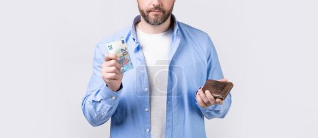 Photo for Cropped photo of moneyless man with wallet. moneyless man with wallet isolated on studio background. moneyless man with wallet in studio. moneyless man with wallet at hand. - Royalty Free Image