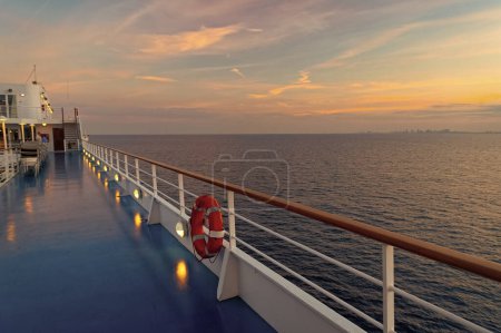 Photo for Lifebuoy at boat trip in twilight. lifebuoy at boat trip view. lifebuoy at boat trip vacation. photo of lifebuoy at boat trip cruising. - Royalty Free Image