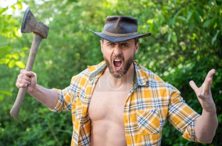 Photo for Shouting angry lumberjack with axe wearing checkered shirt. angry lumberjack with axe outdoor. photo of angry lumberjack with axe. angry lumberjack with axe. - Royalty Free Image