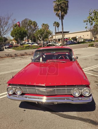 Photo for Los Angeles, California USA - March 28, 2021: red chevrolet impala vintage car front view. - Royalty Free Image