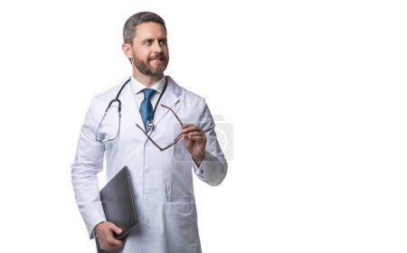 Photo for Doctor promoting emedicine isolated on white, copy space. doctor offering emedicine in studio. doctor presenting emedicine on background. photo of emedicine and doctor man with laptop. - Royalty Free Image