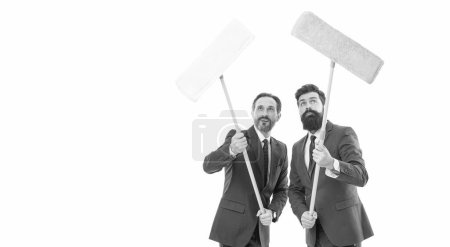 Téléchargez les photos : Cleaning service concept. Cover our tracks before someone find out financial fraud. Clear reputation. Bearded men formal suits hold mops. Big cleaning day. Cleaning business. Household duties. - en image libre de droit