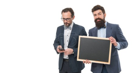 Photo for Formal businessmen use phone, copy space. partners celebrate start up business isolated on white. announcement. formal party invitation. bearded men hold advertisement blackboard. welcome on board. - Royalty Free Image