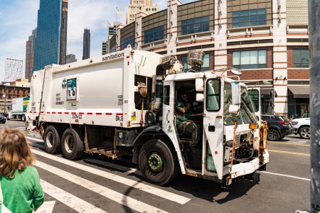 Photo for New York City, USA - May 12, 2023: Sanitation Department truck on the road - Royalty Free Image