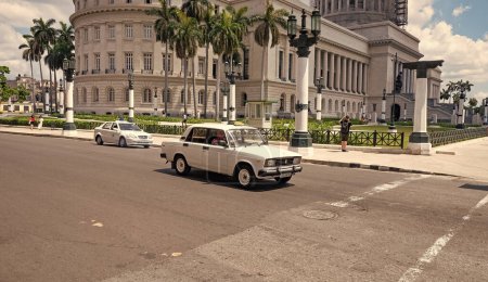 Photo for Havana, Cuba - May 02, 2019: National Capitol Building with moskvitch azlk car. - Royalty Free Image