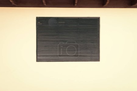 Photo for Louvers shutter on the wall. louvers shutter facade. louvers shutter exterior. photo of louvers shutter. - Royalty Free Image