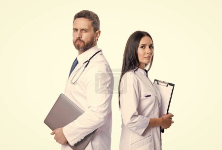 Photo for Doctor and internist isolated on white background. doctor with internist in studio. photo of doctor and internist wear white coat. internist and doctor with laptop and anamnesis. - Royalty Free Image