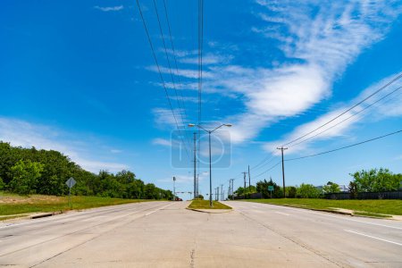 Photo for Travelling by road way. road way with no cars. empty road with destination in horizon. road way with power lines and junction. - Royalty Free Image