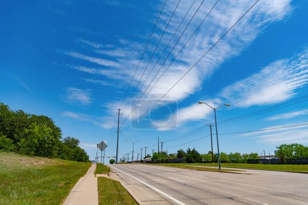 Photo for Road way with power lines. travelling by road way. road way with no cars. empty road with destination in horizon. trip route. - Royalty Free Image