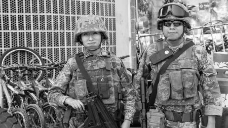 Photo for Acapulco, Mexico - May 12, 2019: army military soldiers officers with gun. - Royalty Free Image