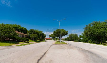 Photo for Empty road with destination in horizon. road way with power lines. travelling by road way. road way with no cars. neighborhood area. - Royalty Free Image