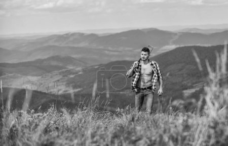 Photo for Guy hiker enjoy pure nature. Musician hiker find inspiration in mountains. Peaceful hiker. Carefree wanderer. Vast expanses. Conquer the peaks. Man hiker with guitar walking on top of mountain. - Royalty Free Image