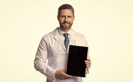 Photo for Doctor promoting ehealth isolated on white. doctor offering ehealth in studio. doctor presenting ehealth on background. photo of ehealth and doctor man with tablet. - Royalty Free Image