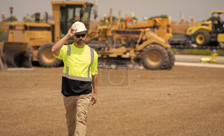 Photo for Construction inspector man, copy space. construction inspector man at building site. construction inspector man outdoor. construction inspector man in uniform. - Royalty Free Image