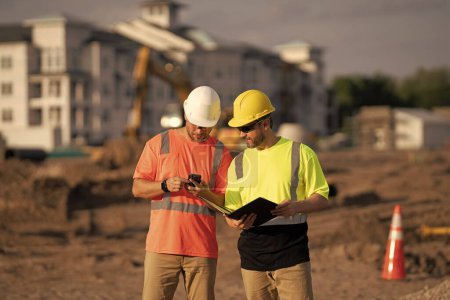 Photo for Architect men with construction project. architect men with construction project. architect men discussing construction project outdoor. architect men have construction project on clipboard. - Royalty Free Image