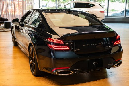Photo for New York City, USA - August 06, 2023: Genesis G80 black Hyundai electric car rear and driver side view parked at dealer salon. - Royalty Free Image