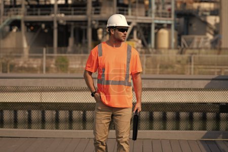 Photo for Engineer man at construction site. engineer man at construction site wearing hardhat. engineer man at construction site outdoor. engineer man at construction site. - Royalty Free Image